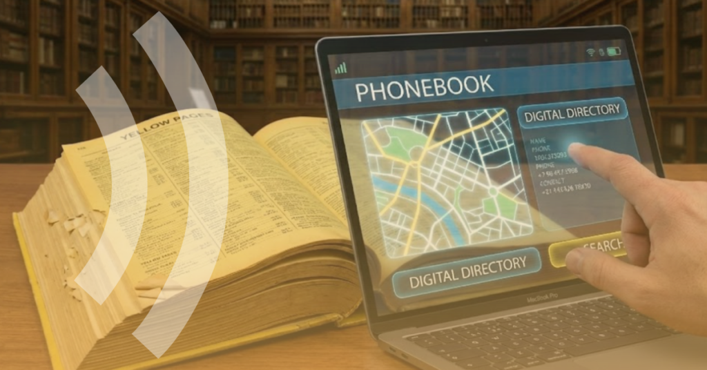 Business contact search on a laptop with a phonebook, illustrating the uk phonebook going digital