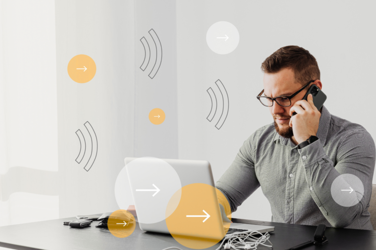 Man using a laptop in an office environment for business communications and remote working.