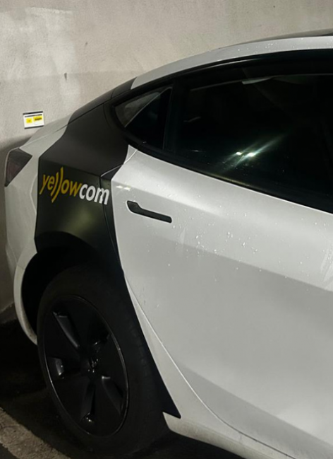 Yellowcom Tesla vehicle representing business phone systems Edinburgh
