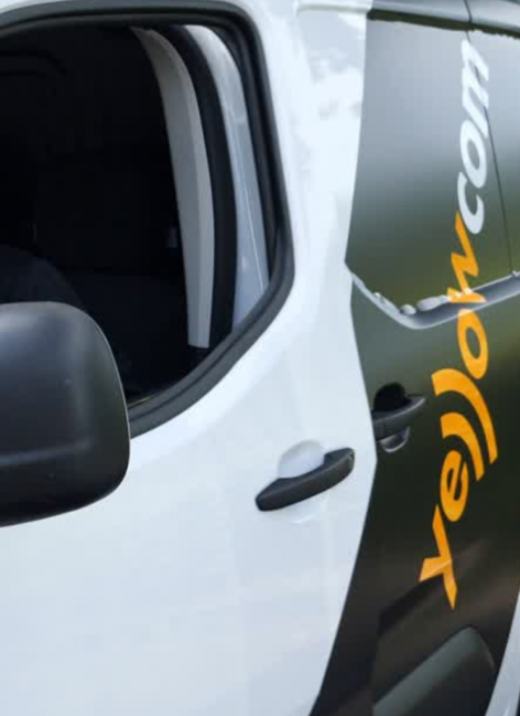 engineer in yellowcom van installing donegal vop to ensure business phone systems donegal