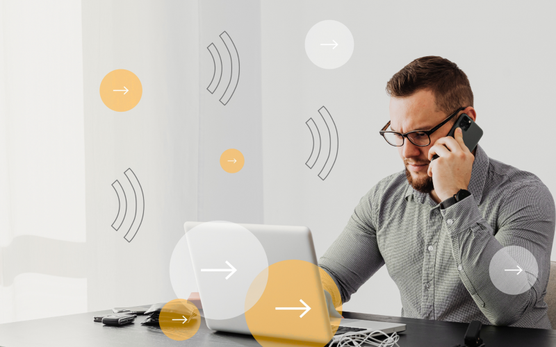 Man using a laptop in an office environment for business communications and remote working.